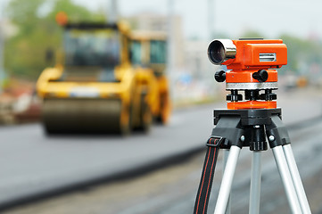 Image showing survey equipment at asphalting works