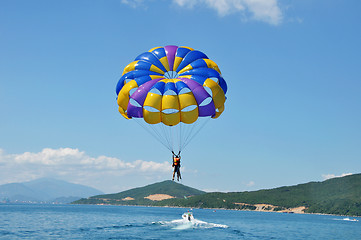 Image showing Paragliding on beach