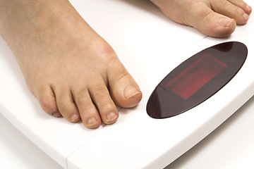 Image showing feet on white scale