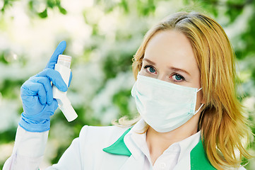 Image showing doctor with spray inhaler