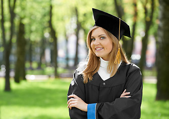 Image showing smiling graduate girl