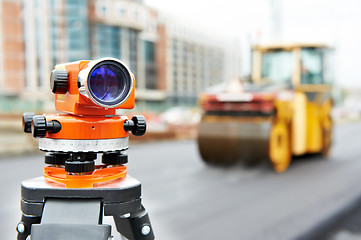 Image showing survey equipment at asphalting works