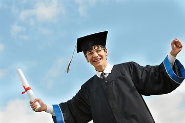 Image showing Happy graduate student in gown