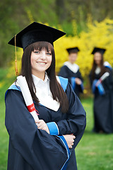 Image showing one cheerful graduate girl