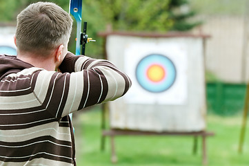 Image showing Archer aiming with bow
