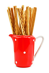 Image showing Bread sticks to milkman