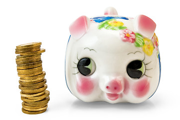 Image showing Piggy Bank with a column of coins