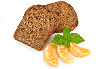 Image showing Rye bread with raisins and tangerines