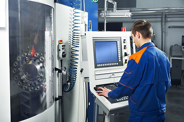 Image showing worker at tool workshop