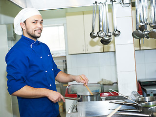 Image showing chef boiling a soup