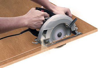 Image showing Carpenter with Saw