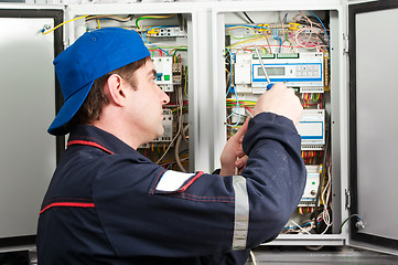 Image showing Electrician at work