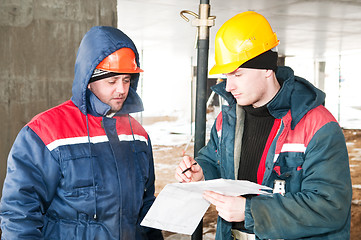 Image showing Engineers builders at construction site