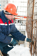 Image showing construction worker making reinforcement