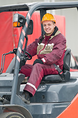 Image showing warehouse worker driver in  forklift