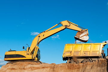 Image showing excavator and dumper truck