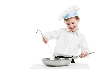 Image showing chef with pan and trowel isolated