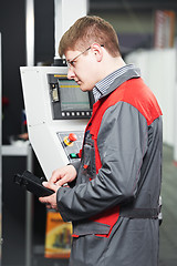 Image showing worker at machining tool workshop