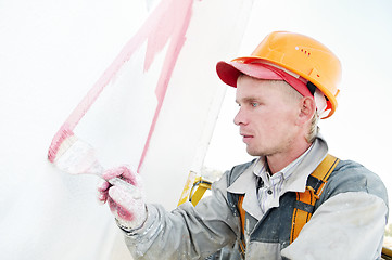 Image showing builder facade painter at work