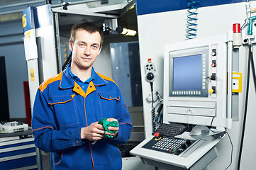 Image showing worker at tool workshop