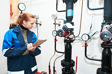 Image showing heating engineer in boiler room