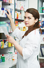 Image showing Pharmacy chemist woman in drugstore