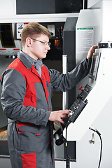 Image showing worker at machining tool workshop