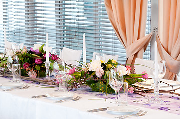 Image showing catering table set with flowers