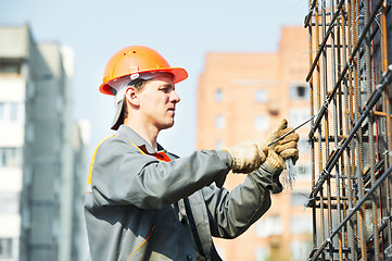 Image showing construction worker making reinforcement