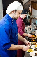 Image showing chefs at decoration food