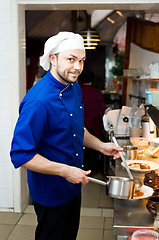 Image showing chef with scoop