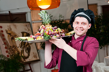 Image showing Cheerful chef cook with fruits