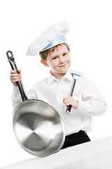 Image showing chef with pan and trowel isolated