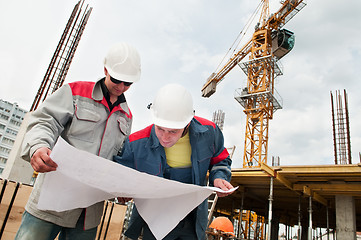 Image showing Engineers builders at construction site