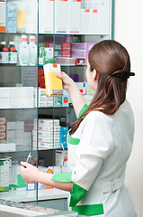 Image showing Pharmacy chemist woman in drugstore