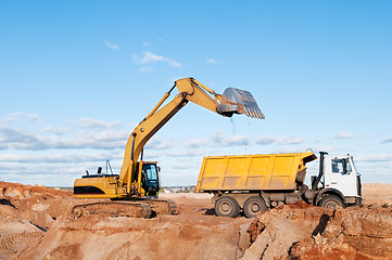 Image showing excavator and dumper truck