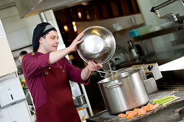 Image showing chef at work in kitchen