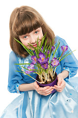 Image showing little girl with crocus spring flower