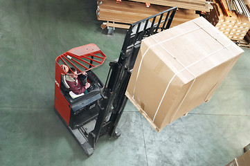 Image showing warehouse stacker at work