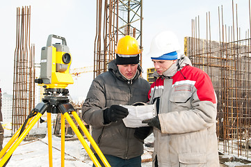 Image showing Surveying works at construction site