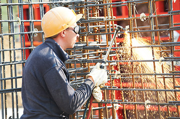 Image showing construction worker with flame cutting equipment