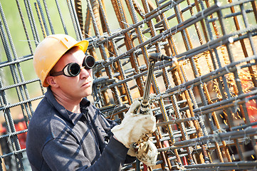 Image showing construction worker with flame cutting equipment