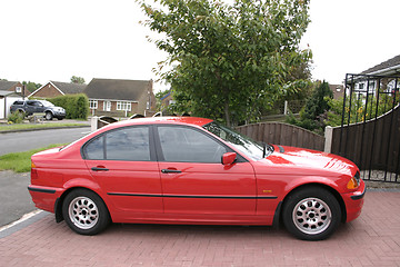 Image showing red bmw sideview