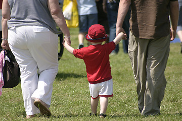 Image showing walking with mummy and daddy