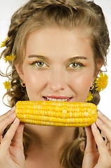 Image showing woman eating corn-cob