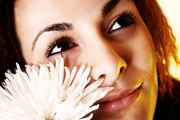 Image showing Girl with a white flower