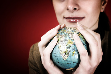 Image showing Globe in a girl's hands