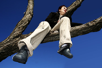 Image showing Girl in a tree