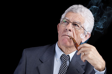 Image showing Senior businessman thinking