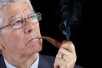 Image showing Senior businessman thinking